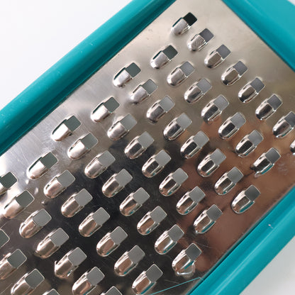 ChefMate Grater™ – Durable kitchen tool for vegetables & cheese.